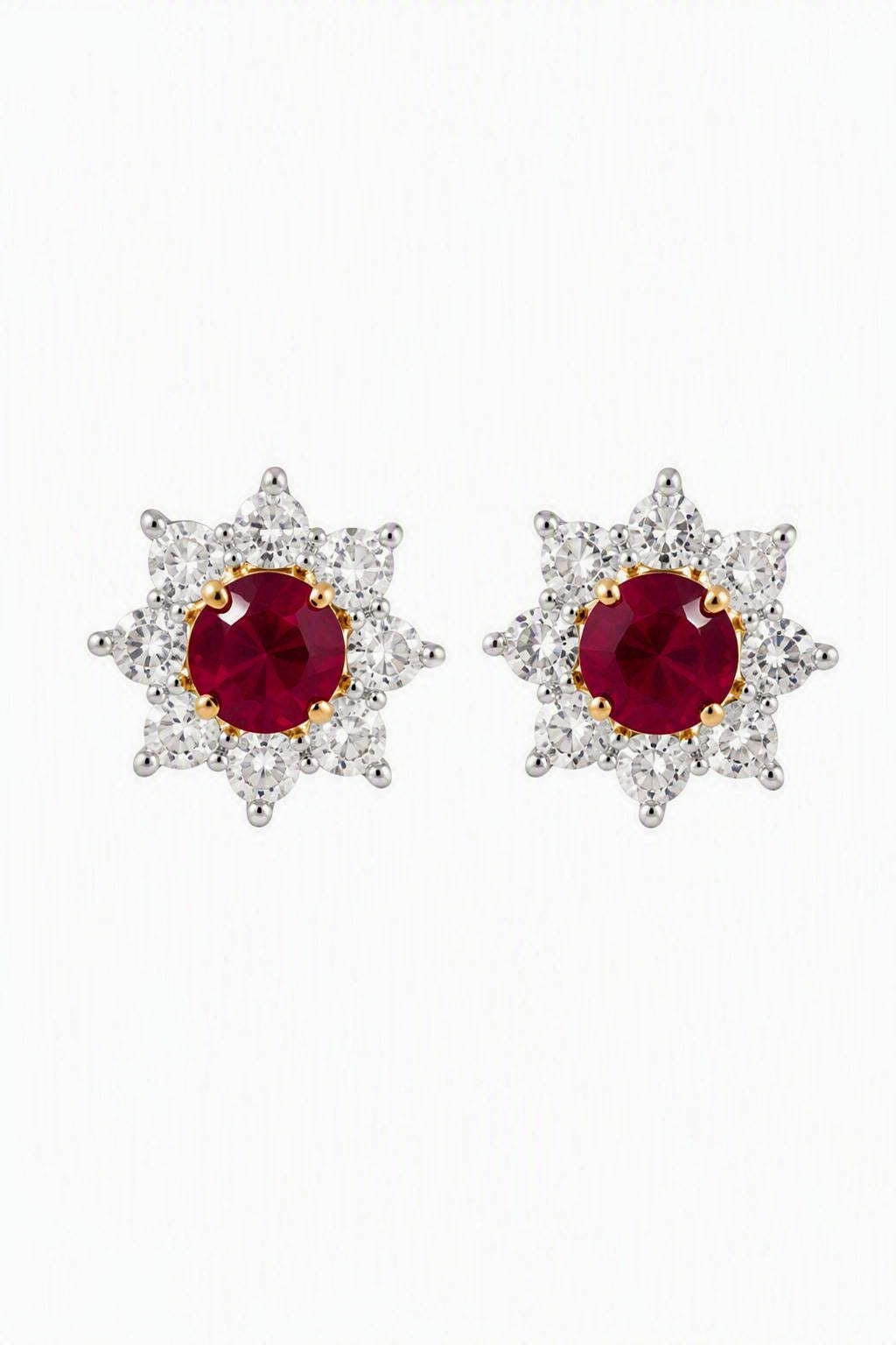 Aretes de rubí con halo de estrella